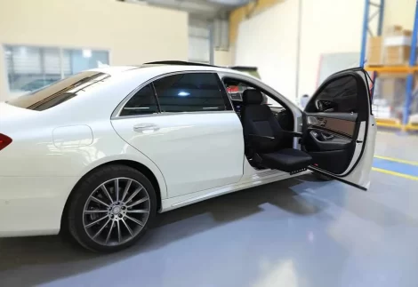 Turny Low Entry car seat fitted in a saloon car for disabled access