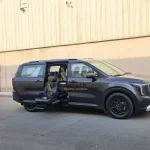Kia Carnival Turny Orbit out view in Dubai by Manafeth