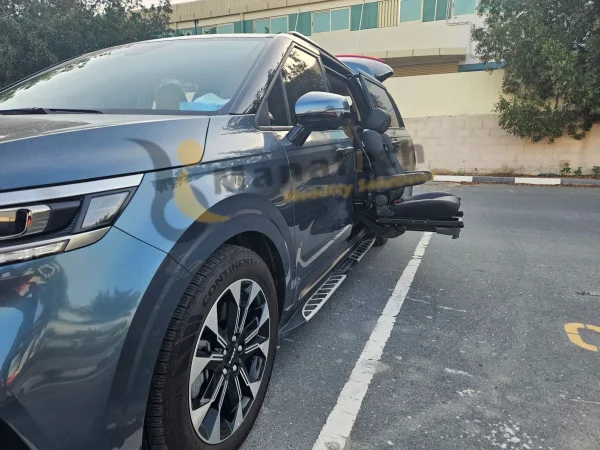Kia Carnival Turny seat out left side view