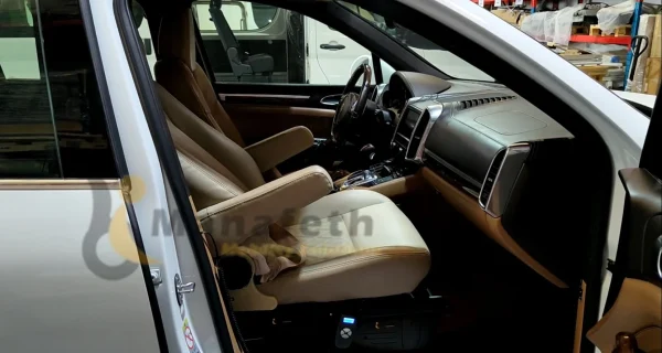 Porsche Cayenne S with swivel seat inside view