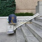 Stair lift for stairs installed outside front view
