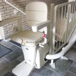 Stairlift for stairs standing at top in dubai Manafeth