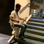 Stairlift with a disabled man in Arabian Ranches by Manafeth