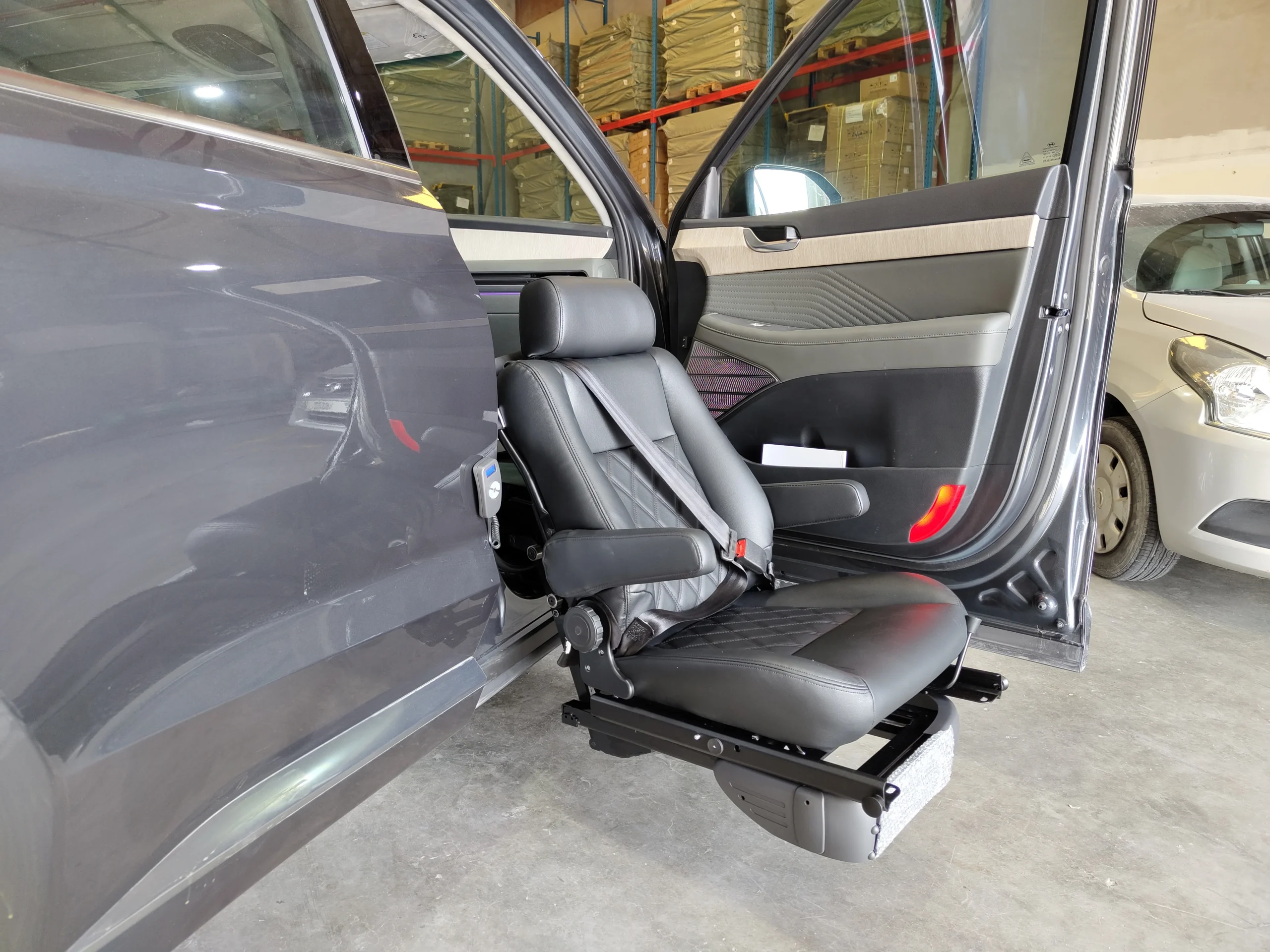 Exterior passenger side view of Turny Seat Lift Hyundai Palisade for Handicaped accessibility