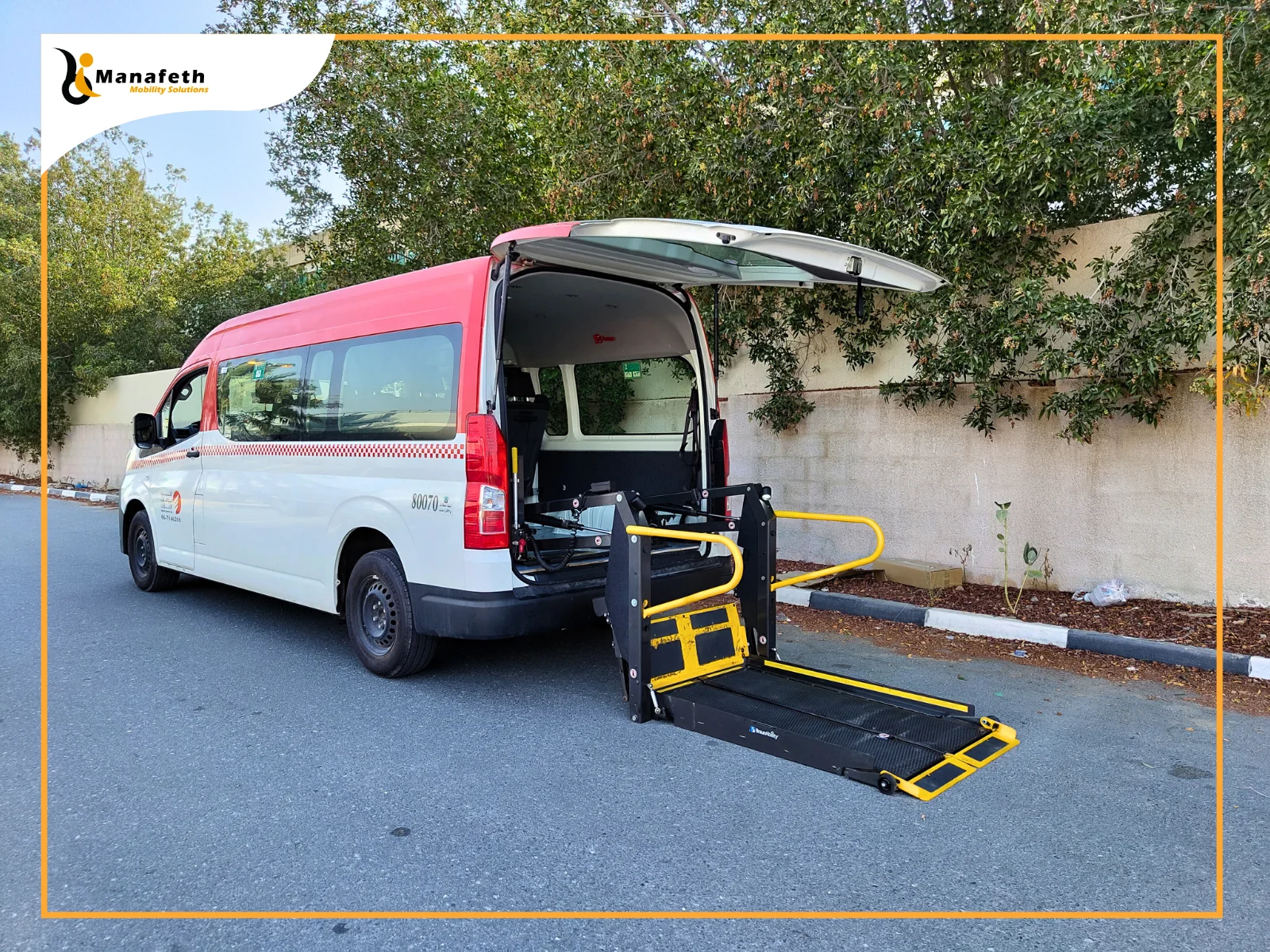 Wheelchair lift installed in a Toyota Hiace of Emirates Transport taxi